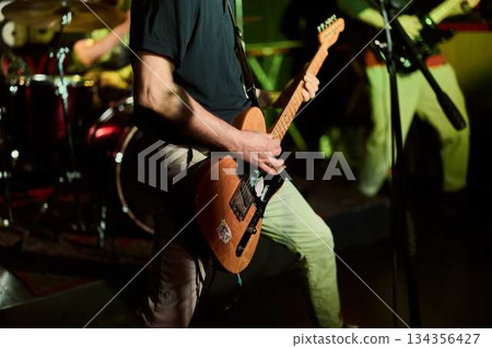 An Upclose Photograph Illustrating Precise Finger Positioning With Stage Illumination And Musical Intensity An Upclose Photograph Illustrating Precise Finger Positioning With Stage Illumination And Musical Intensity 134356427