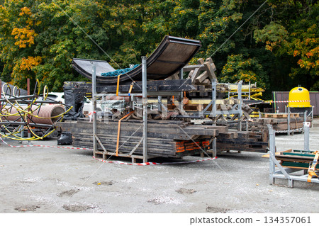 Construction site shows stacked materials and equipment in preparation--------- 134357061