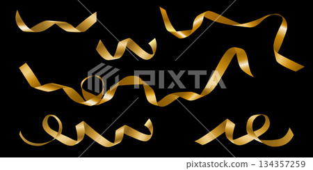 Curly golden ribbon set for gift wrapping on a black background Curly golden ribbon set for gift wrapping on a black background 134357259