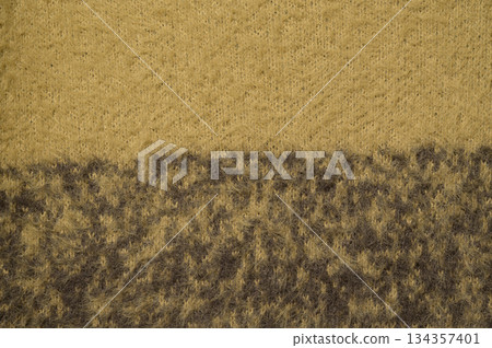 Close-up,High resolution of yellow and medium-brown knit or woven texture. Close-up,High resolution of yellow and medium-brown knit or woven texture. 134357401