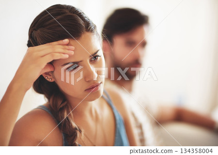 Unhappy, upset or conflict with a couple arguing about an affair or breakup on their home living room sofa. Depression, abuse or domestic violence with a sad woman thinking of divorce after a fight Unhappy, upset or conflict with a couple arguing about an affair or breakup on their home living room sofa. Depression, abuse or domestic violence with a sad woman thinking of divorce after a fight 134358004