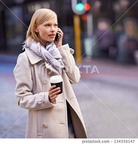 City, phone call and business woman with coffee for travel, morning commute and journey. Connection, communication and person talking on smartphone for networking, conversation and discussion in town 134358147