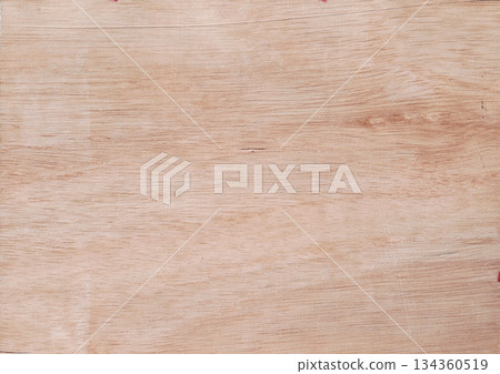 Detailed close-up view of pale beech or birch plywood veneer natural light brown surface background. Detailed close-up view of pale beech or birch plywood veneer natural light brown surface background. 134360519