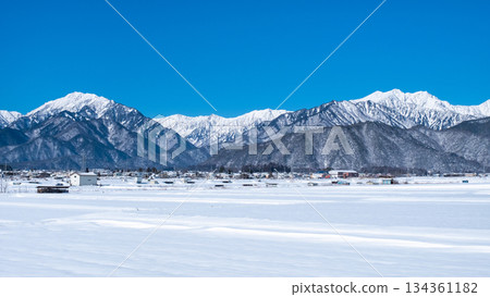 View of the Northern Alps from Omachi City (winter) 134361182