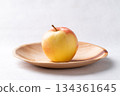 Red apple fruit (Gala apple) in natural plate on white background 134361645