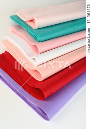 Set of floral tissue wrapping paper sheets. Soft lightweight translucent paper for bouquet wrapping gift packaging floristry decor in pastel and bright colors. Set of floral tissue wrapping paper sheets. Soft lightweight translucent paper for bouquet wrapping gift packaging floristry decor in pastel and bright colors. 134361876