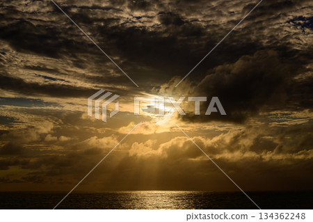 Dark clouds and sunset over the sea 134362248