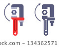 Tighten a nut with a plumber wrench. 134362571