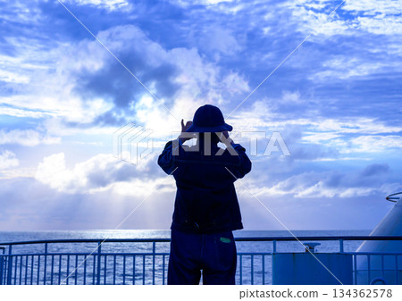Rear view of the sea and sky from the boat 134362578