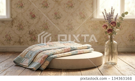 Vintage Podium with Folded Quilt and Glass Vase of Dried Flowers Vintage Podium with Folded Quilt and Glass Vase of Dried Flowers 134363168