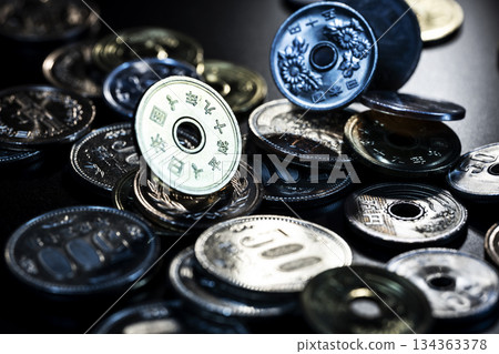 Currency concept with coins falling Currency concept with coins falling 134363378