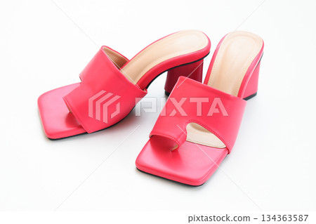 beautiful pink leather heel shoe isolated on white background beautiful pink leather heel shoe isolated on white background 134363587