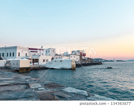 Mykonos little venice at sunset showing traditional cycladic architecture with whitewashed buildings along the aegean sea coastline 134363877