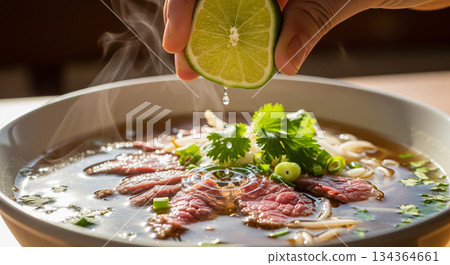 Lime Squeezed Over Hot Beef Pho 134364661