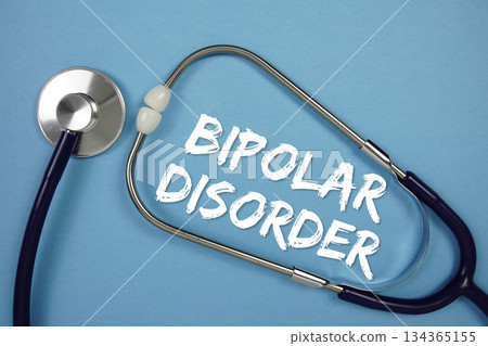 Bipolar Disorders text with Stethoscope on blue background Bipolar Disorders text with Stethoscope on blue background 134365155
