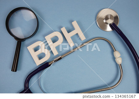BPH Benign Prostatic Hyperplasia text with Stethoscope and magnifying glass on blue background BPH Benign Prostatic Hyperplasia text with Stethoscope and magnifying glass on blue background 134365167