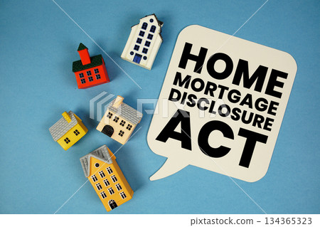 HMDA Home Mortgage Disclosure Act text with house models on blue background HMDA Home Mortgage Disclosure Act text with house models on blue background 134365323