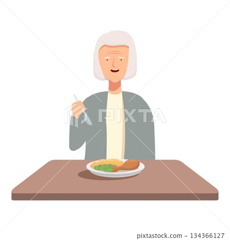 Senior woman enjoying a meal at home Senior woman enjoying a meal at home 134366127