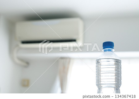 Room cooler and plastic bottles Room cooler and plastic bottles 134367418