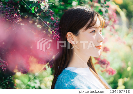 Flower and young woman 134367718