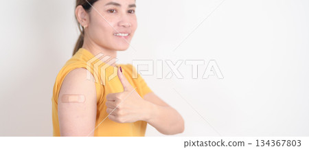 Adult Woman with bandage after received vaccine. Vaccination and Immunization for Influenza, HPV, Zoster, IPD, DTP or Diphtheria, Tetanus and Pertussis, MMR, Hepatitis B, Covid and Varicella vaccine Adult Woman with bandage after received vaccine. Vaccination and Immunization for Influenza, HPV, Zoster, IPD, DTP or Diphtheria, Tetanus and Pertussis, MMR, Hepatitis B, Covid and Varicella vaccine 134367803