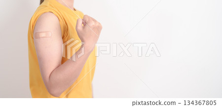 Adult Woman with bandage after received vaccine. Vaccination and Immunization for Influenza, HPV, Zoster, IPD, DTP or Diphtheria, Tetanus and Pertussis, MMR, Hepatitis B, Covid and Varicella vaccine Adult Woman with bandage after received vaccine. Vaccination and Immunization for Influenza, HPV, Zoster, IPD, DTP or Diphtheria, Tetanus and Pertussis, MMR, Hepatitis B, Covid and Varicella vaccine 134367805