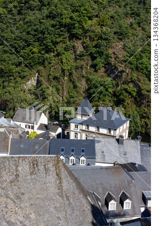 Esch-sur-Sure, Wiltz, Grand-Duche de Luxembourg, September 07, 2025, Drone captures compact homes 134368204