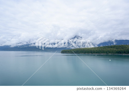 Sea and misty mountains on the route from Vancouver to Alaska 134369264