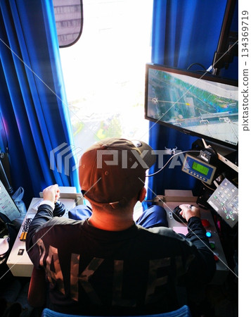 Operator operating a tower crane 134369719