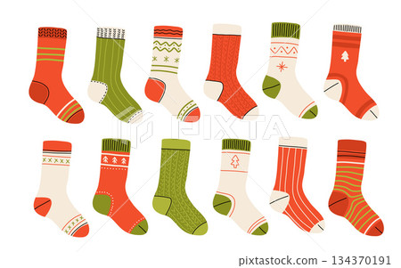 Christmas collection of trendy cotton and woolen socks with different textures isolated on white background. Vector illustration. Knitted winter socks set different colors and sizes. Christmas collection of trendy cotton and woolen socks with different textures isolated on white background. Vector illustration. Knitted winter socks set different colors and sizes. 134370191
