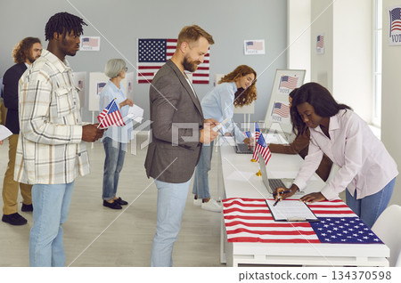 Diverse US citizens come to the polling station during the presidential elections 134370598
