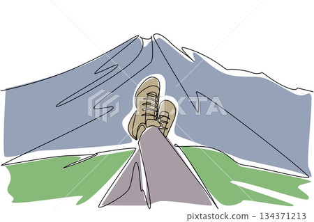 Continuous one line drawing feet wearing hiking shoes are relaxing stacked against a mountain background. Rest with a beautiful view. National Trails Day. Single line draw design vector illustration 134371213