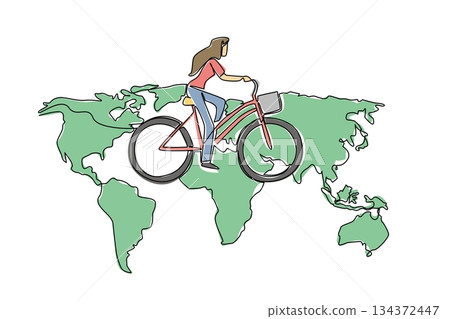 One line drawing of a young beautiful woman cycling on a world map, nature concept, eco-friendly theme for World Bicycle Day, minimalist style promoting sustainable travel worldwide campaign. 134372447