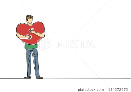 A continuous line drawing of a young man warmly embracing a giant heart against his chest, conveying protection and devotion for Love Conquers All Day in a relationship and compassion concept. 134372473