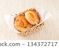 Croissants in a basket 134372717