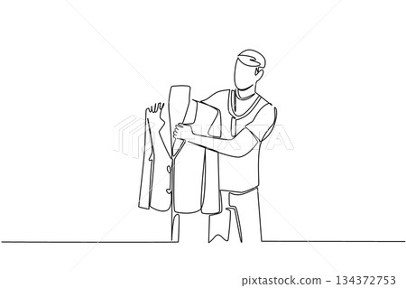 Single line drawing depicts a male tailor examining a suit jacket on a mannequin, representing tailoring industry concept for National Tailors Day, honoring craftsmanship, design, and bespoke app Single line drawing depicts a male tailor examining a suit jacket on a mannequin, representing tailoring industry concept for National Tailors Day, honoring craftsmanship, design, and bespoke app 134372753