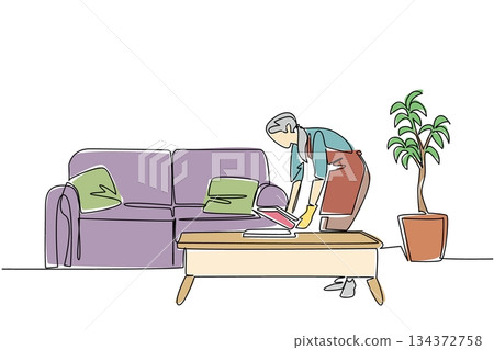One line drawing of a elderly woman cleaning and arranging books on a table in the living room, honoring National Old Maids Day with a housekeeping concept that values hard work and cleanliness. 134372758