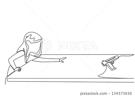 A young girl reaching for a gun placed on a table is shown in continuous line drawing style. This safety concept illustrates the dangers of unsafe storage, reflecting National SAFE Day awareness. 134373030
