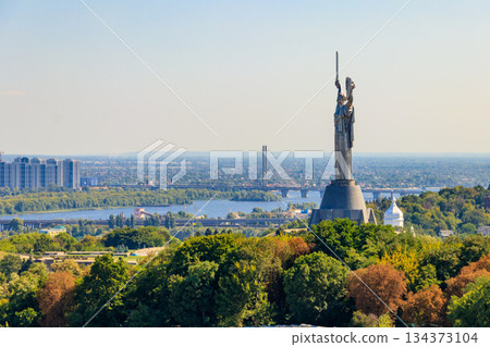 View of Motherland Monument and the Dnieper river in Kiev, Ukraine. Kiev cityscape 134373104
