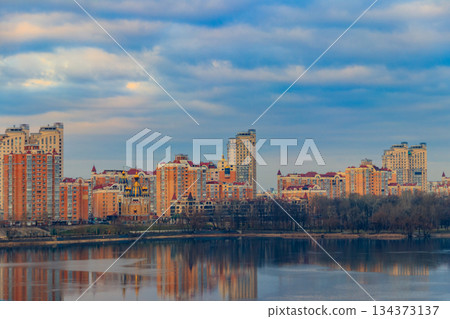 View of Obolon embankment of the Dnieper river and church of the Nativity of Christ in Kiev, Ukraine 134373137
