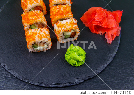 Sushi rolls Philadelphia on a black slate Sushi rolls Philadelphia on a black slate 134373148