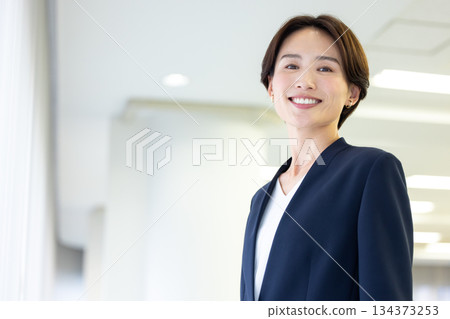 Portrait of a woman in a business suit 134373253