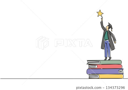 Young graduate man in cap and gown stands on stacked books reaching for a star, symbolizing academic success and dreams, designed for National Higher Education Day in a continuous line drawing 134373296