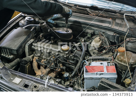 Restoration of Vintage Car Engine. Repairing and Maintaining Old Used Vehicle Restoration of Vintage Car Engine. Repairing and Maintaining Old Used Vehicle 134373913