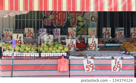 old fashioned fruit stand in market of Kaohsiung. Kaohsiung is famous for its fruit in taiwan market 134374124