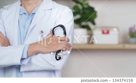 Healthcare Professional with Stethoscope and Crossed Arms Healthcare Professional with Stethoscope and Crossed Arms 134374159