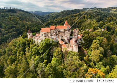 Beautiful old castle in forests with autumn landscape.Beautiful autumn landscape with colorful nature in the Czech Republic in autumn time..Pernstejn - Nedvedice 134374668