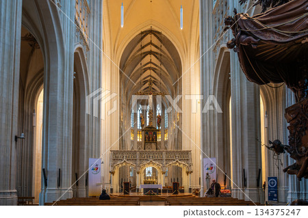 Gothic nave and altar inside Saint Peters Church in Leuven Gothic nave and altar inside Saint Peters Church in Leuven 134375247