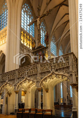 Gothic rood screen and crucifix inside Saint Peters Church in Leuven Gothic rood screen and crucifix inside Saint Peters Church in Leuven 134375249