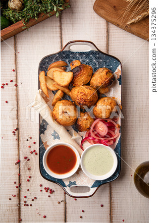 Grilled champignon mushroom skewers with sauce Grilled champignon mushroom skewers with sauce 134375296